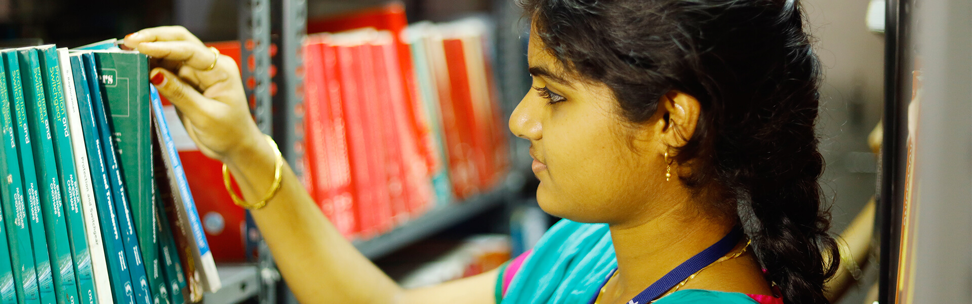 A bright and modern library with rows of bookshelves